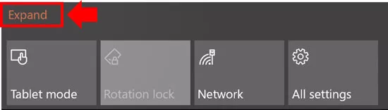 If you only see four tiles in the Action Center, click the Expand option to see the full action center in Windows 10
